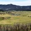 Ranch in a valley.
La Plata County.