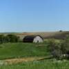 Nestling old quonset barn.
Near Pingree, ND.