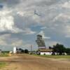 Tilting Adams grain elevator.
(view down main street)