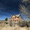 East angle of this austere
old Adamsville mansion.